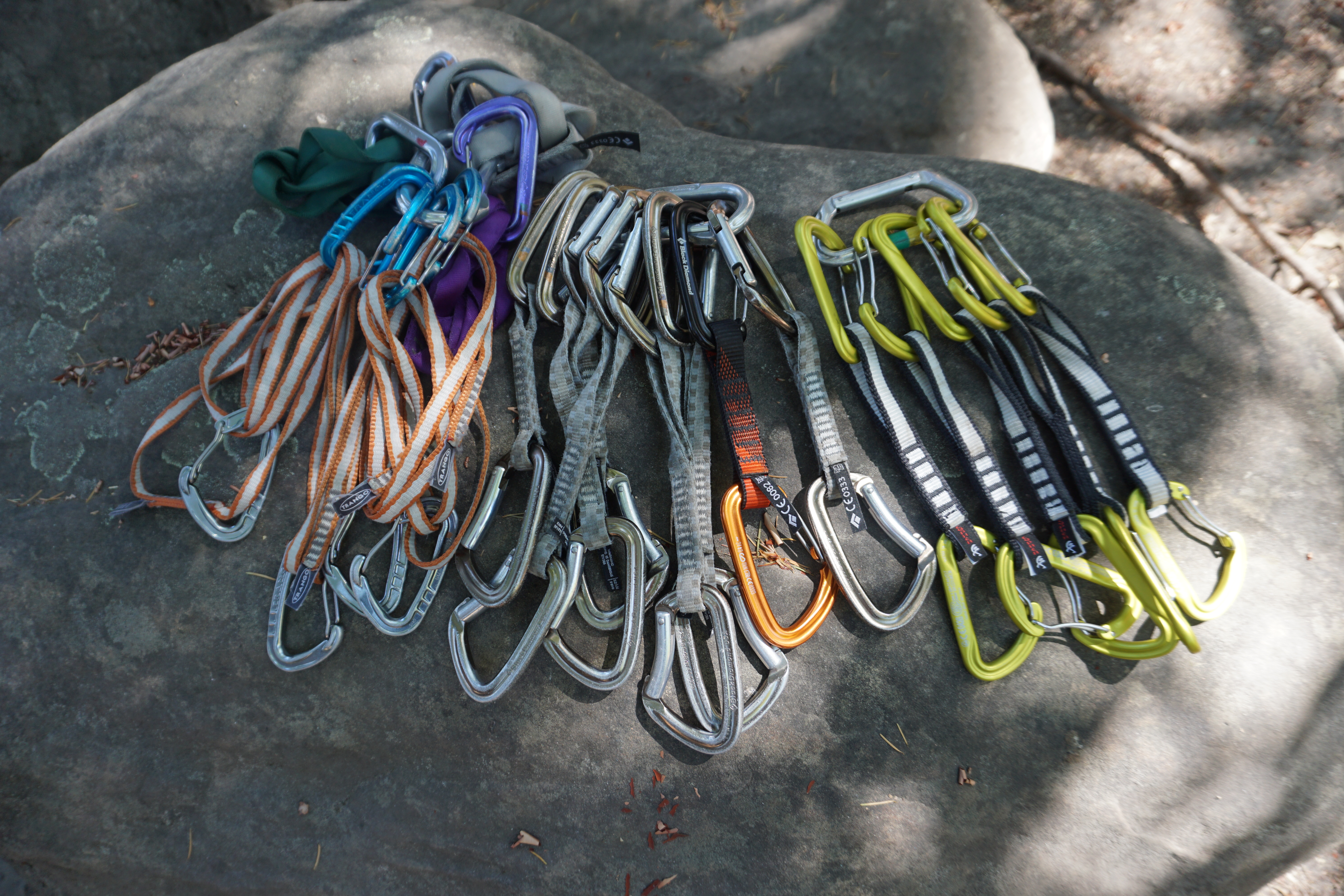 Quickdraws and Alpine draws; part of a trad rack