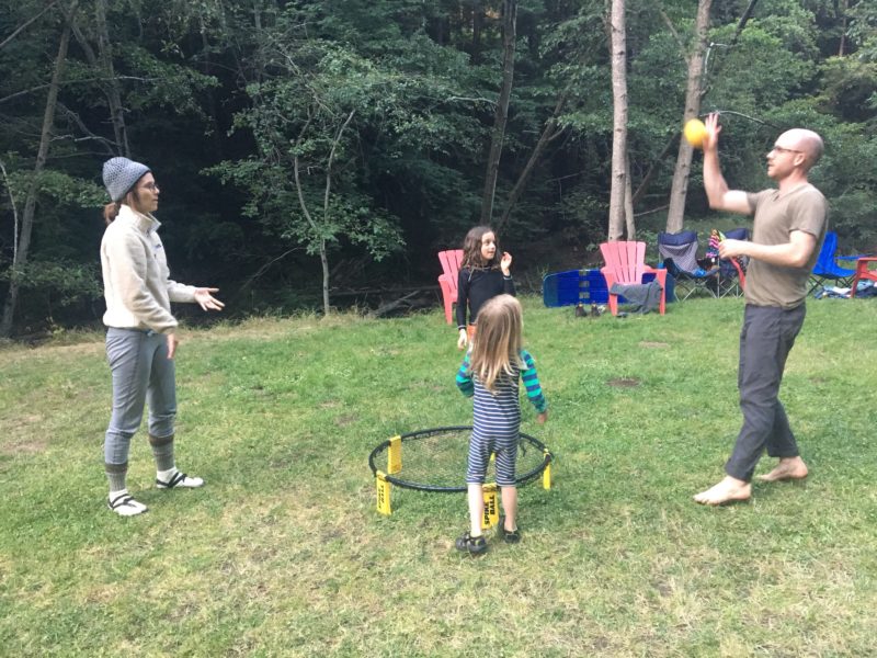 best kids camping playing spikeball
