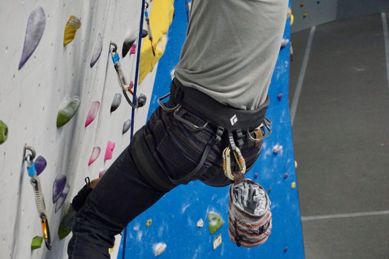 climbing lingo - wearing carabiners to hold your chalk bag