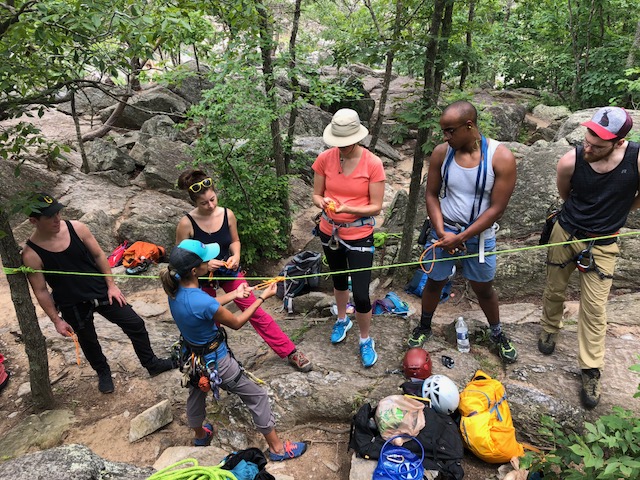 professional rock climbing guide - teaching a lesson